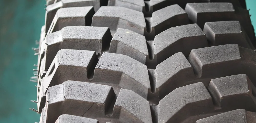 Close-up of a rugged off-road tire tread pattern